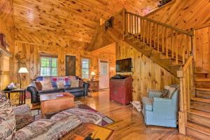 A seating area at Secluded Cabin Between Boone and Blowing Rock!