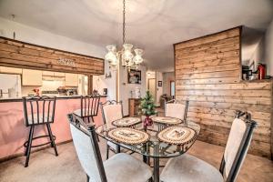 a dining room with a table and chairs at Pagosa Springs Condo, 4 Miles to Hot Springs! in Pagosa Springs