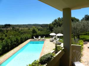The swimming pool at or close to La Compagnia del Chianti