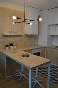 Kuchyňa alebo kuchynka v ubytovaní Last Floor Apartment - Krakow City Center close to Old Town