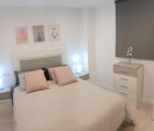 Posteľ alebo postele v izbe v ubytovaní APARTAMENTO PONCE