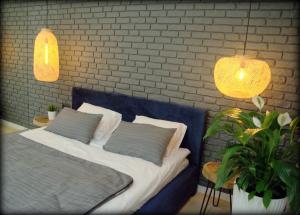 Posteľ alebo postele v izbe v ubytovaní Last Floor Apartment - Krakow City Center close to Old Town