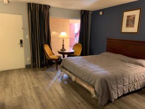 Katil atau katil-katil dalam bilik di City Center Motel
