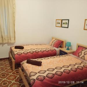 Postel nebo postele na pokoji v ubytování Casa Mayans