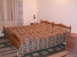 Ліжко або ліжка в номері Dili Villa