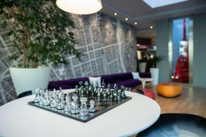 a tray of glasses on a table in a room at Best Western Plus Executive Hotel and Suites in Turin