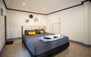 Ліжко або ліжка в номері Andaman Peace Resort