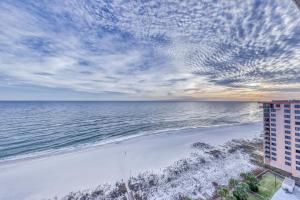 a view of the beach from a balcony of a building at Regency Isle in Orange Beach