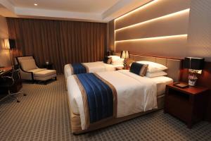 Katil atau katil-katil dalam bilik di Yangon Thanlwin Hotel
