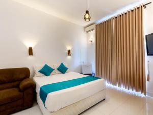 Royal Mount Hotel客房内的一张或多张床位