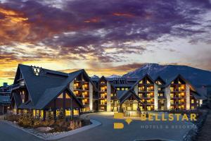 a large building with a sky background at Grande Rockies Resort-Bellstar Hotels & Resorts in Canmore