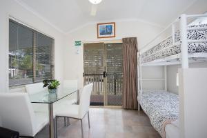 Postel nebo postele na pokoji v ubytování Tiaro Tourist Stopover