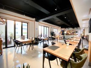 Un restaurante u otro lugar para comer en Stay Pohang Hotel