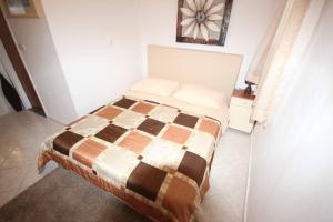 Postel nebo postele na pokoji v ubytování Small Apartment For A Great Holiday