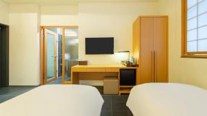 TV a/nebo společenská místnost v ubytování Seoul Hotel ShinShin Myeongdong + 37 fotografií
