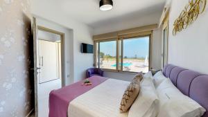 Posteľ alebo postele v izbe v ubytovaní Liberty & Freedom Luxury Villas + 37 fotografií