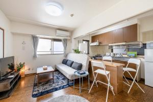 Kuchyň nebo kuchyňský kout v ubytování Uhome Akihabara Apartment 3