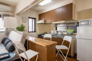 Kuchyň nebo kuchyňský kout v ubytování Uhome Akihabara Apartment 3
