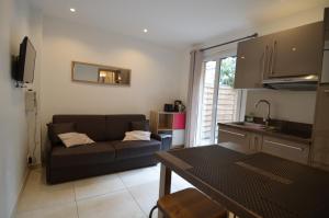 Кухня или кухненски бокс в Appartement 4 personnes grande terrasse dans le Carré d Or à Nice