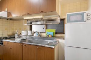 Kuchyň nebo kuchyňský kout v ubytování Uhome Akihabara Apartment 3