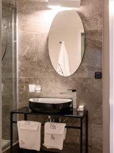 Ein Badezimmer in der Unterkunft ArtLoft Garni Hotel