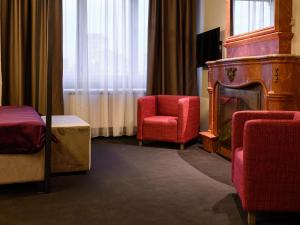 Ein Sitzbereich in der Unterkunft ArtLoft Garni Hotel