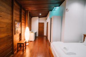 Voodi või voodid majutusasutuse Sukhothai Garden toas