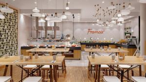Um restaurante ou outro lugar para comer em Holiday Inn Frankfurt - Alte Oper by IHG