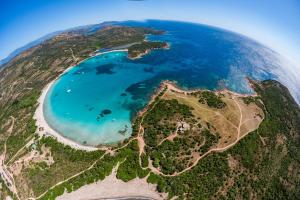 an aerial view of a island with a body of water at Résidence Santa Monica in Bonifacio