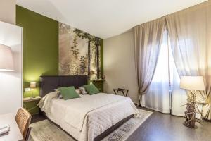 Postel nebo postele na pokoji v ubytování B&b Igea 50