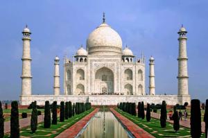 a view of the taj mahal with trees in front at Regal Hotel and restaurant in Mathura