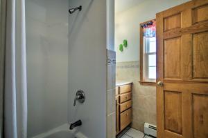 a bathroom with a tub and a shower at Old Orchard Beach Apt - Walk to Beach and Pier! in Old Orchard Beach +20 photos