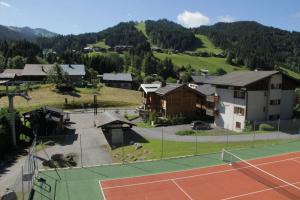Tennis eller squash på eller i nærheten av Bel app aux Gets 10mn centre ski parking tennis privé