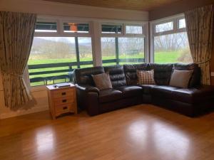 Posezení v ubytování Logierait Pine Lodges