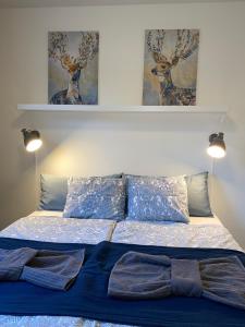 Ένα ή περισσότερα κρεβάτια σε δωμάτιο στο Noah longstay Arboga