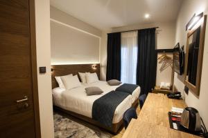 Llit o llits en una habitació de Trikala River House