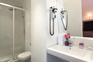 Salle de bains dans l'établissement Virgina