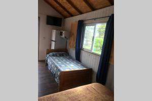 En eller flere senge i et værelse på Poseidon ll