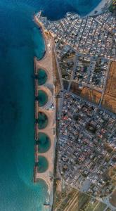an aerial view of a building next to the water at Dimore di Mare in San Pietro Vernotico