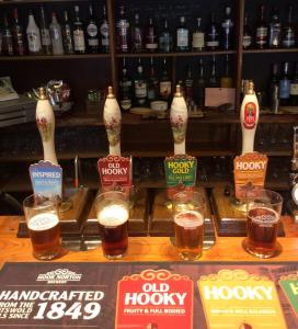 a group of glasses of beer on a table at The Star Inn in Sulgrave