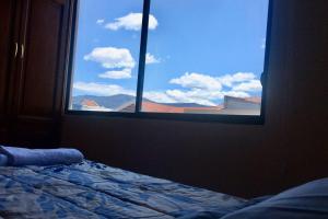 Postel nebo postele na pokoji v ubytování Confortable mini departamento