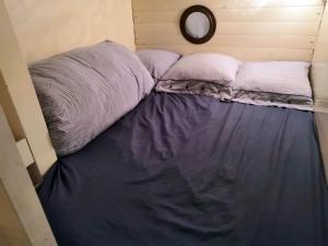 เตียงในห้องที่ Korriganez - Fête de la Belle Angèle - Pont-Aven
