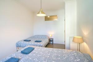 เตียงในห้องที่ Apartment with Rooftop Terrace in the Heart of Antwerp