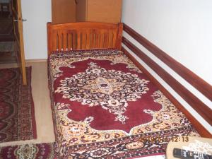 Ein Bett oder Betten in einem Zimmer der Unterkunft Vila Mihaela