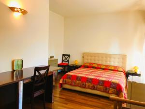 A bed or beds in a room at Maison d'Elite