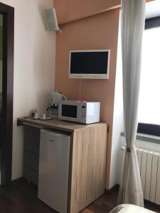 A kitchen or kitchenette at Maison d'Elite