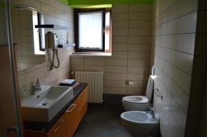 A bathroom at Maison d'Elite