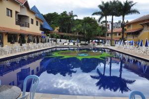 The swimming pool at or near Resort Recanto do Teixeira All Inclusive