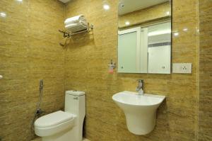 Koupelna v ubytování Hotel Yuvraj Deluxe
