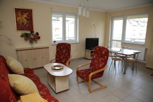 Телевизор и/или развлекательный центр в Apartament Bałtycka Plaża
